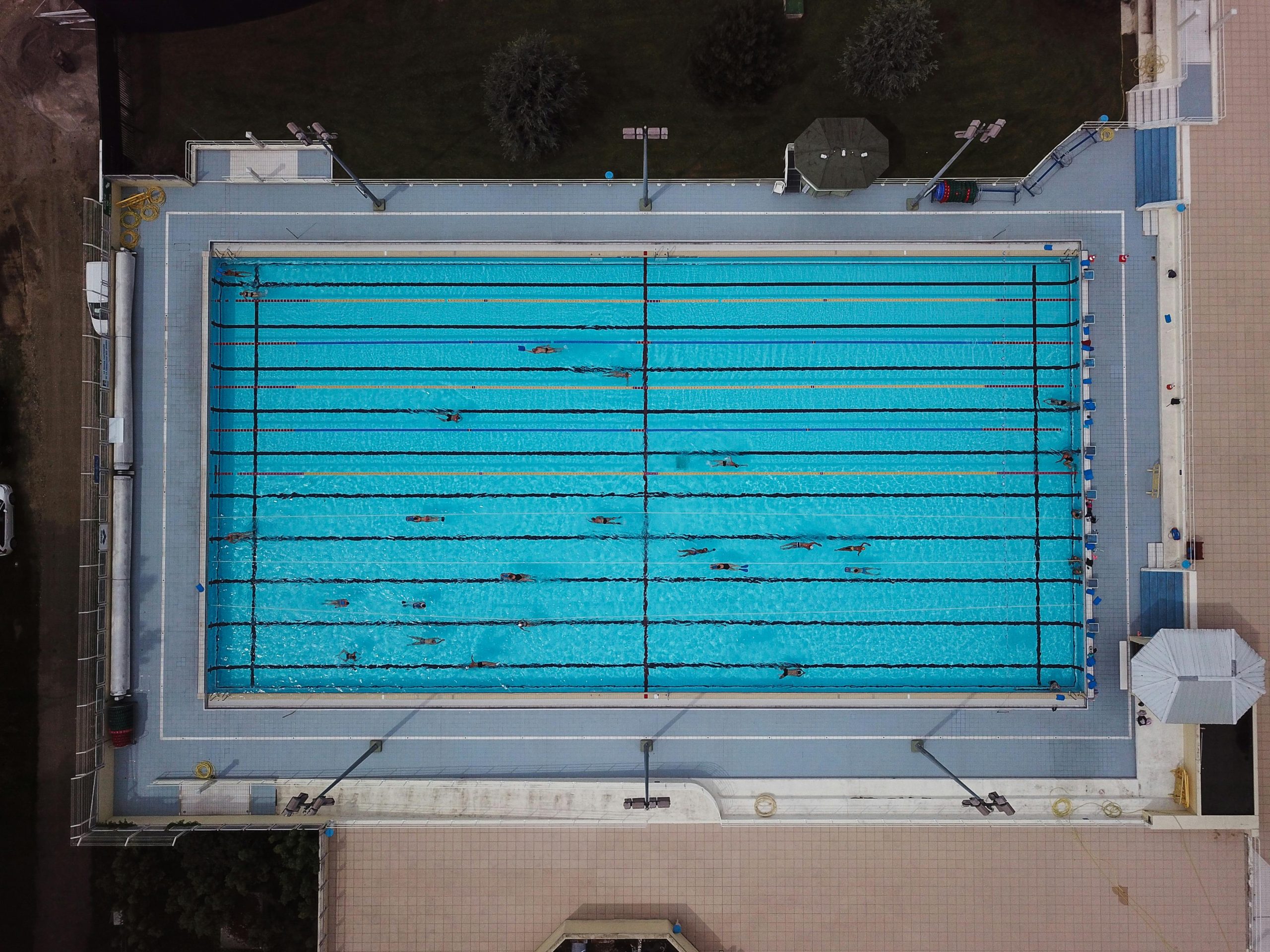 Top view of a swimming pool in Rouen, Normandy, France, with swimmers.