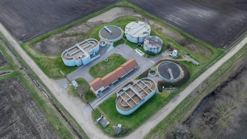 Aerial photo of sewage treatment plant in Saint-Marcel-Bel-Accueil, France.